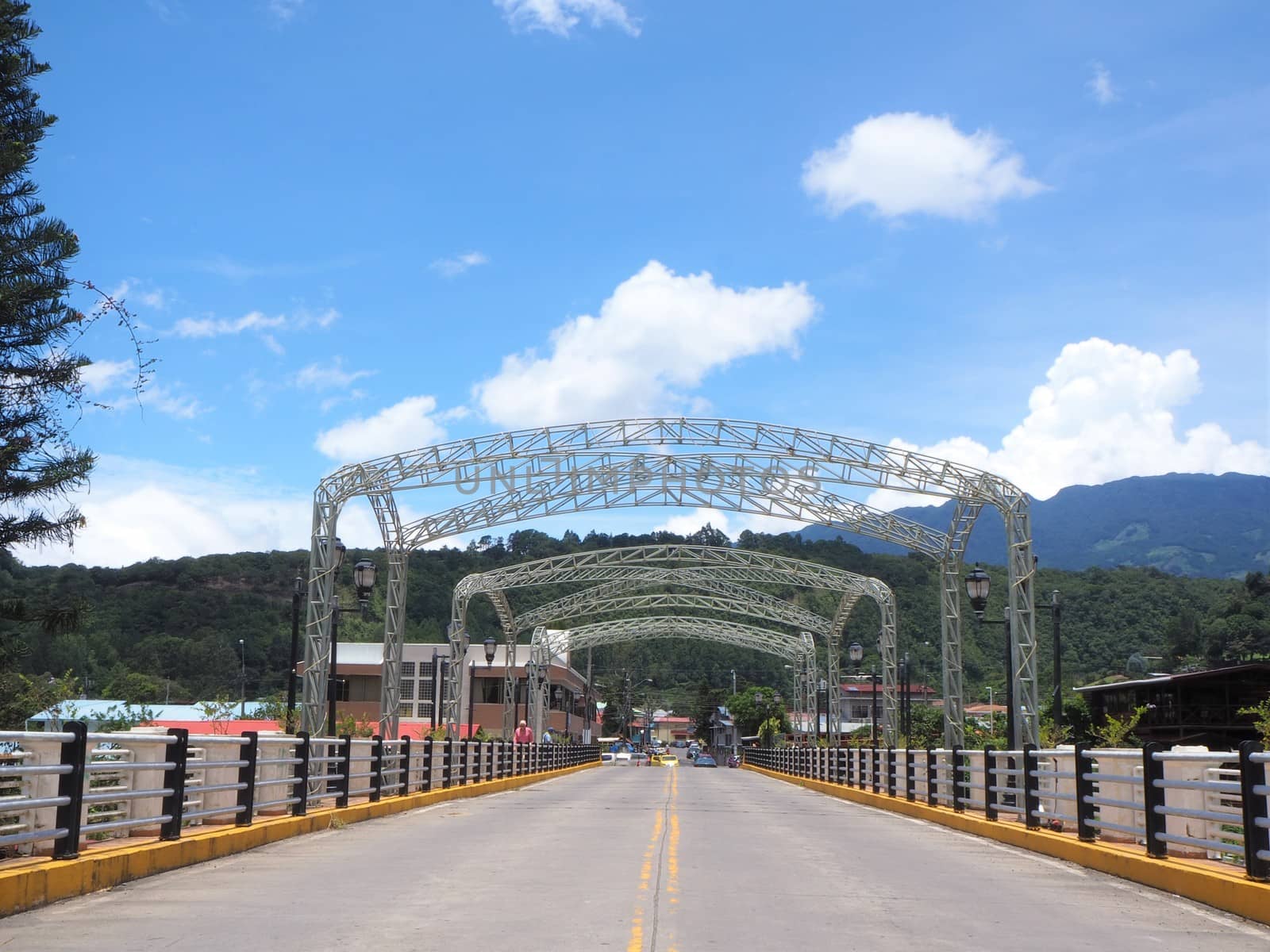 Steel arch suspension road and pedestrian bridge over the Caldera River in Boquete, Panama Highlands.