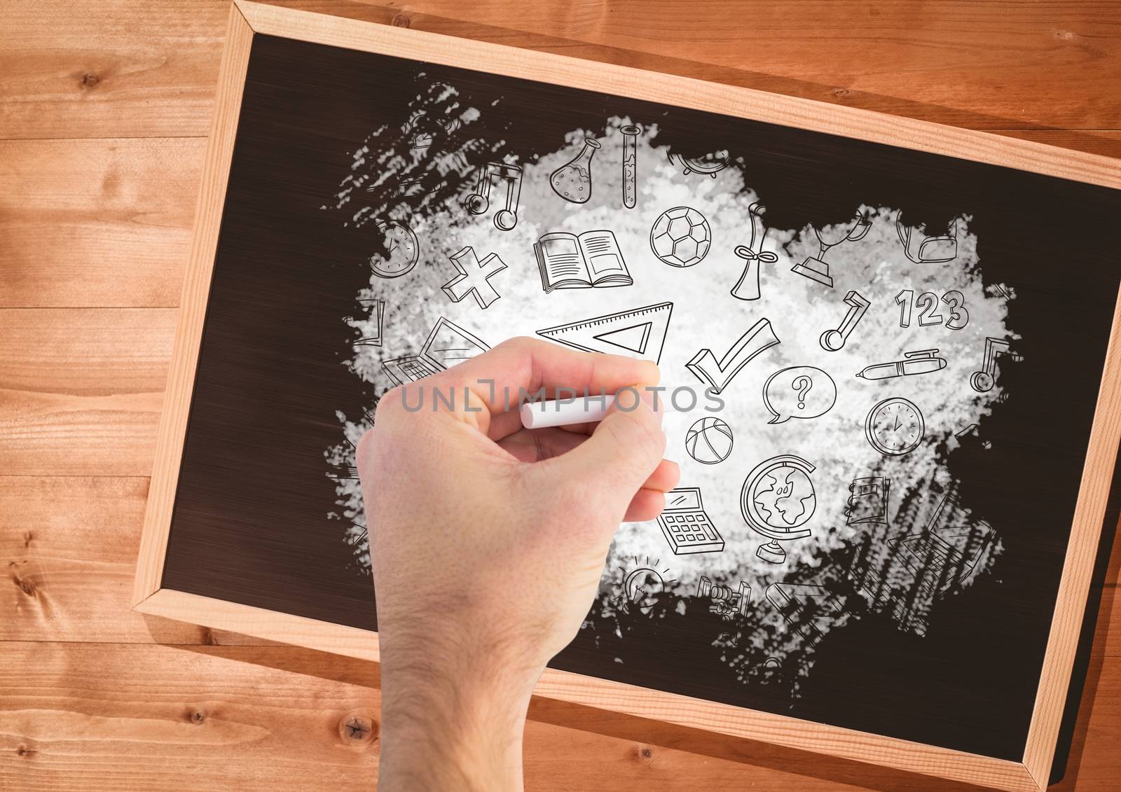 Digital composite of Hand drawing education graphics on blackboard