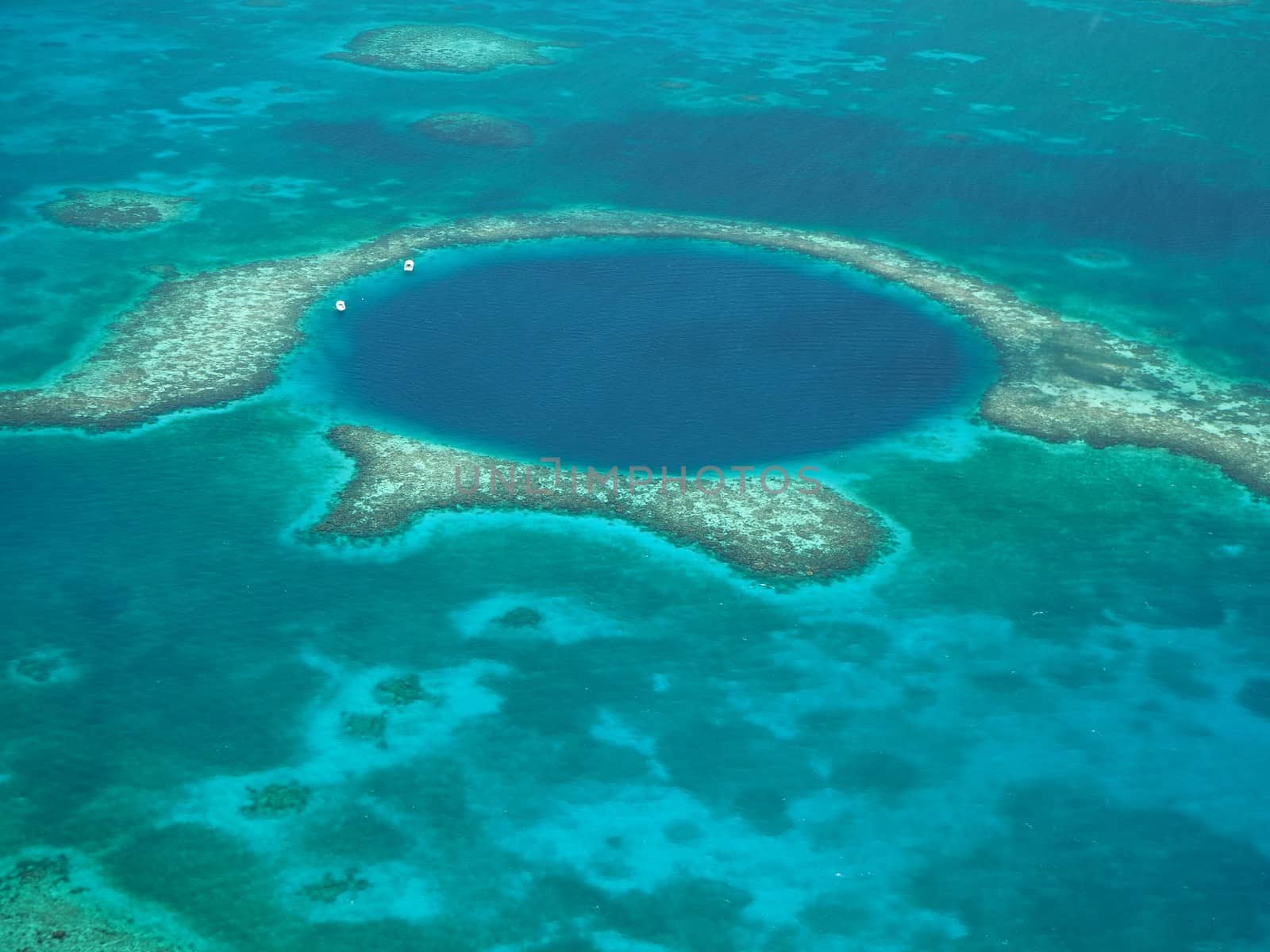 Aerial photo from flying over the blue hole in a small plane.