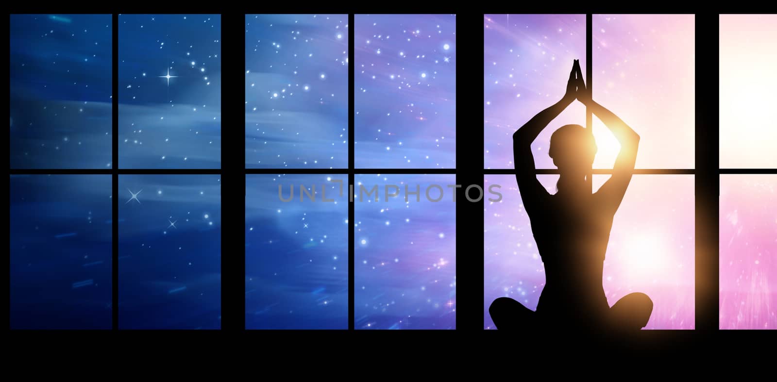 Silhouette female practicing yoga while sitting against digitally composite image of colorful lights 