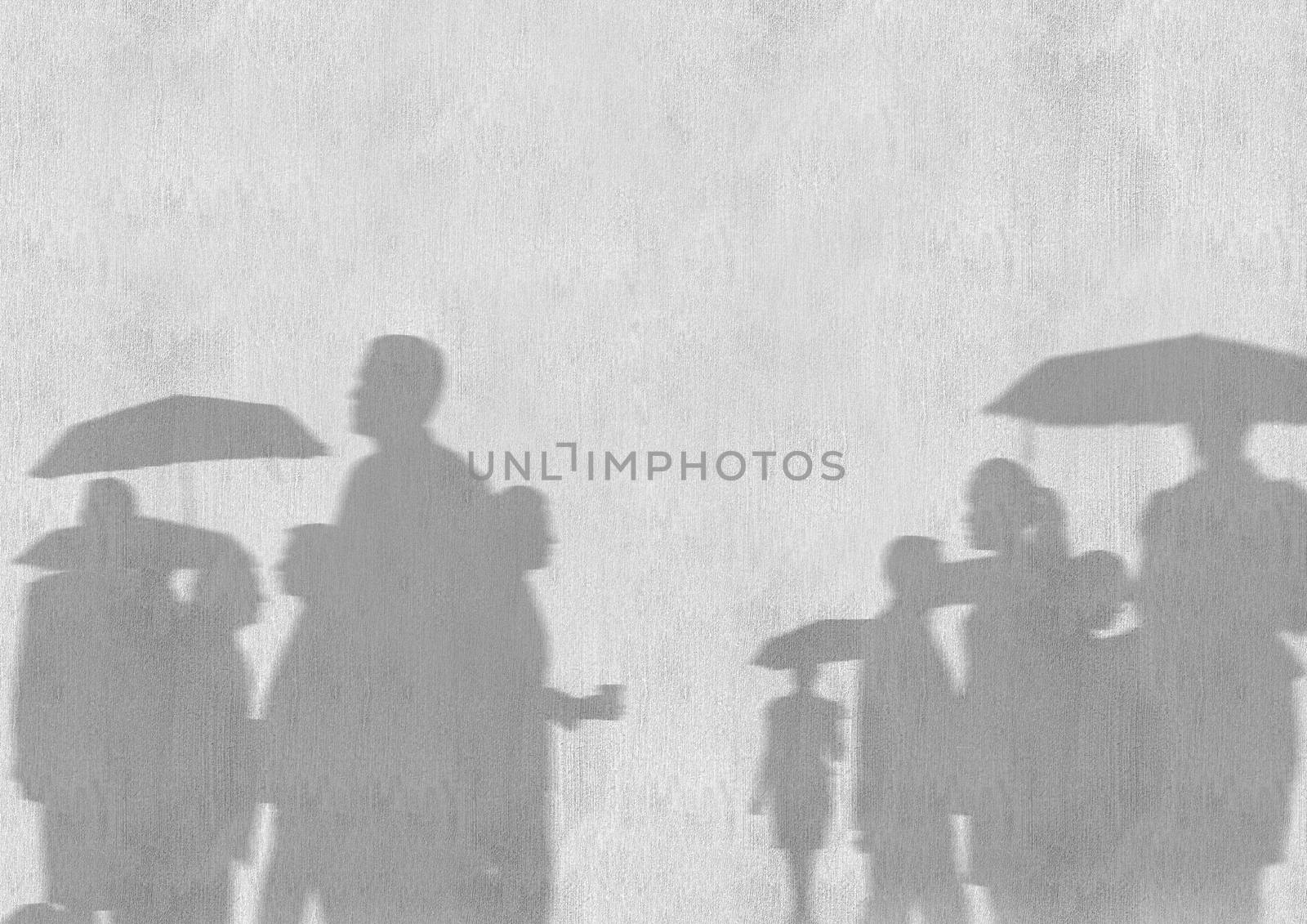 Digital composite of Business people silhouettes against white wall