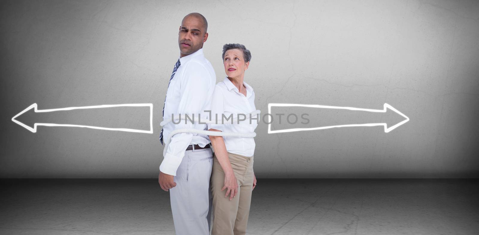Composite image of business people standing back to back by Wavebreakmedia