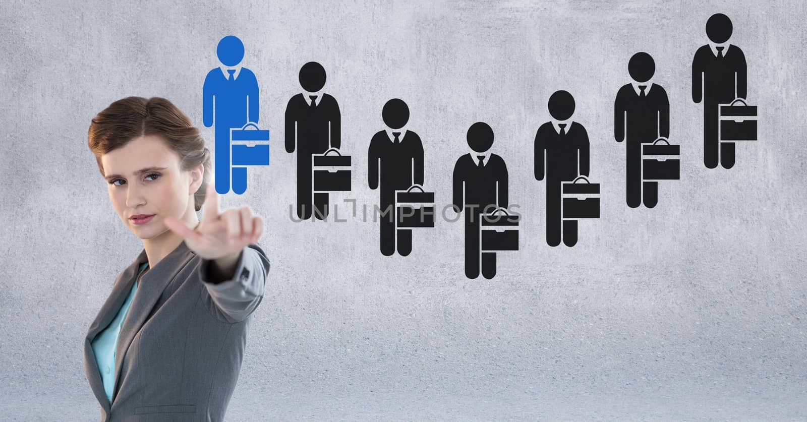 Businesswoman interacting and choosing a person from group of people icons by Wavebreakmedia