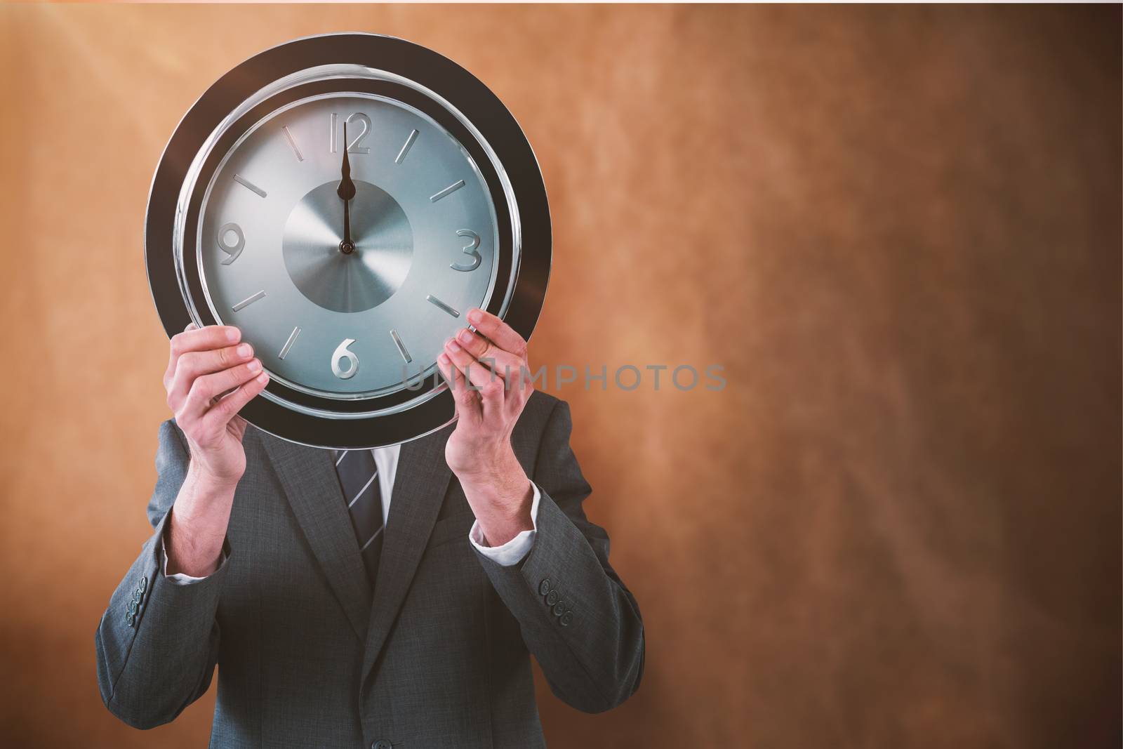 Businessman holding clock in front of his face against brown grocery bag texture