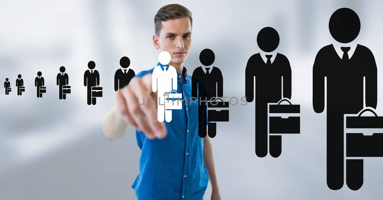 Businessman interacting and choosing a person from group of people icons by Wavebreakmedia