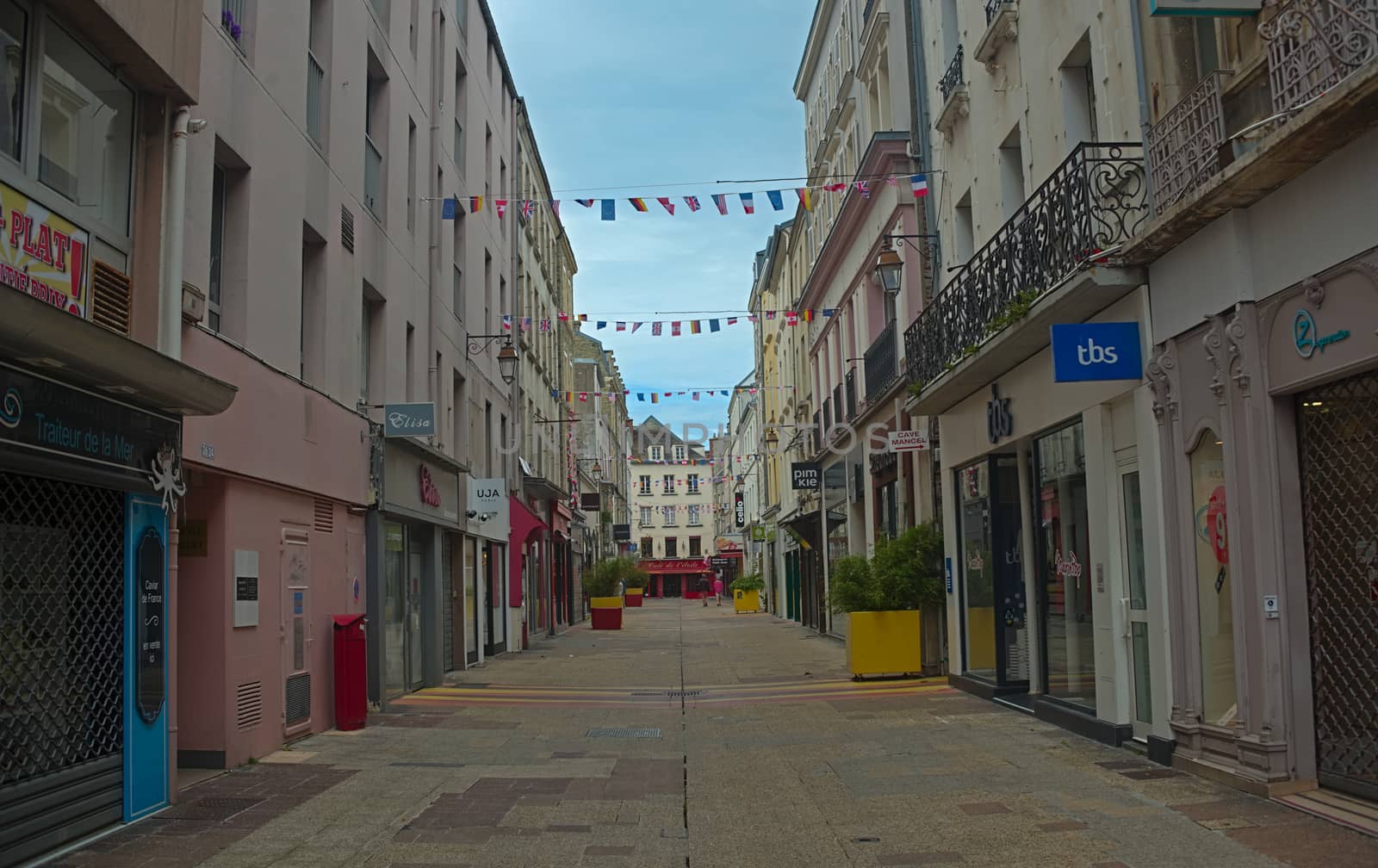 CHERBOURG, FRANCE - June 6th 2019 - Empty street with stone building in traditional town