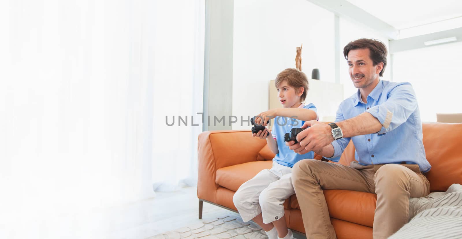 Father and son play video game by ALotOfPeople