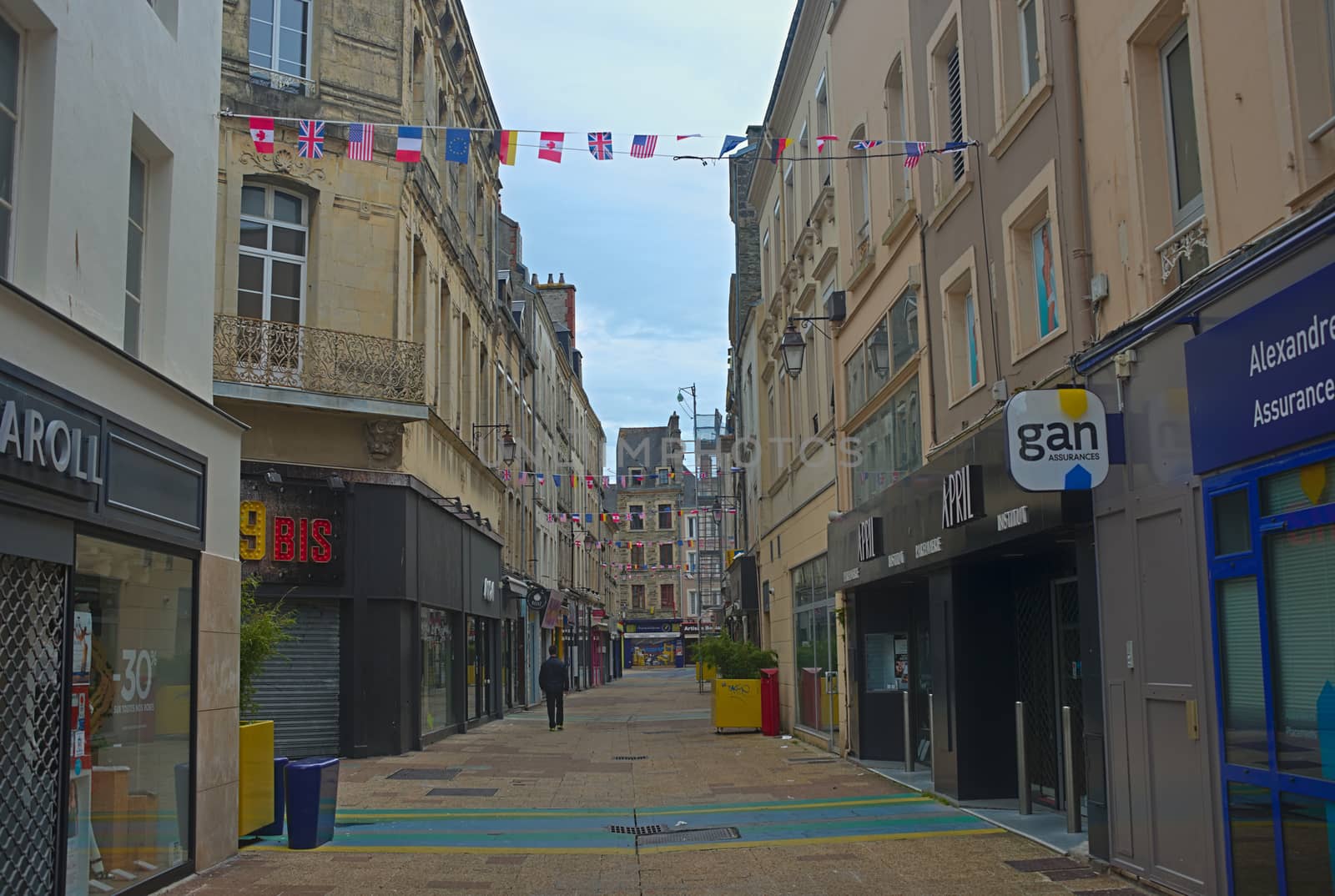 CHERBOURG, FRANCE - June 6th 2019 - Empty street with stone building in traditional town