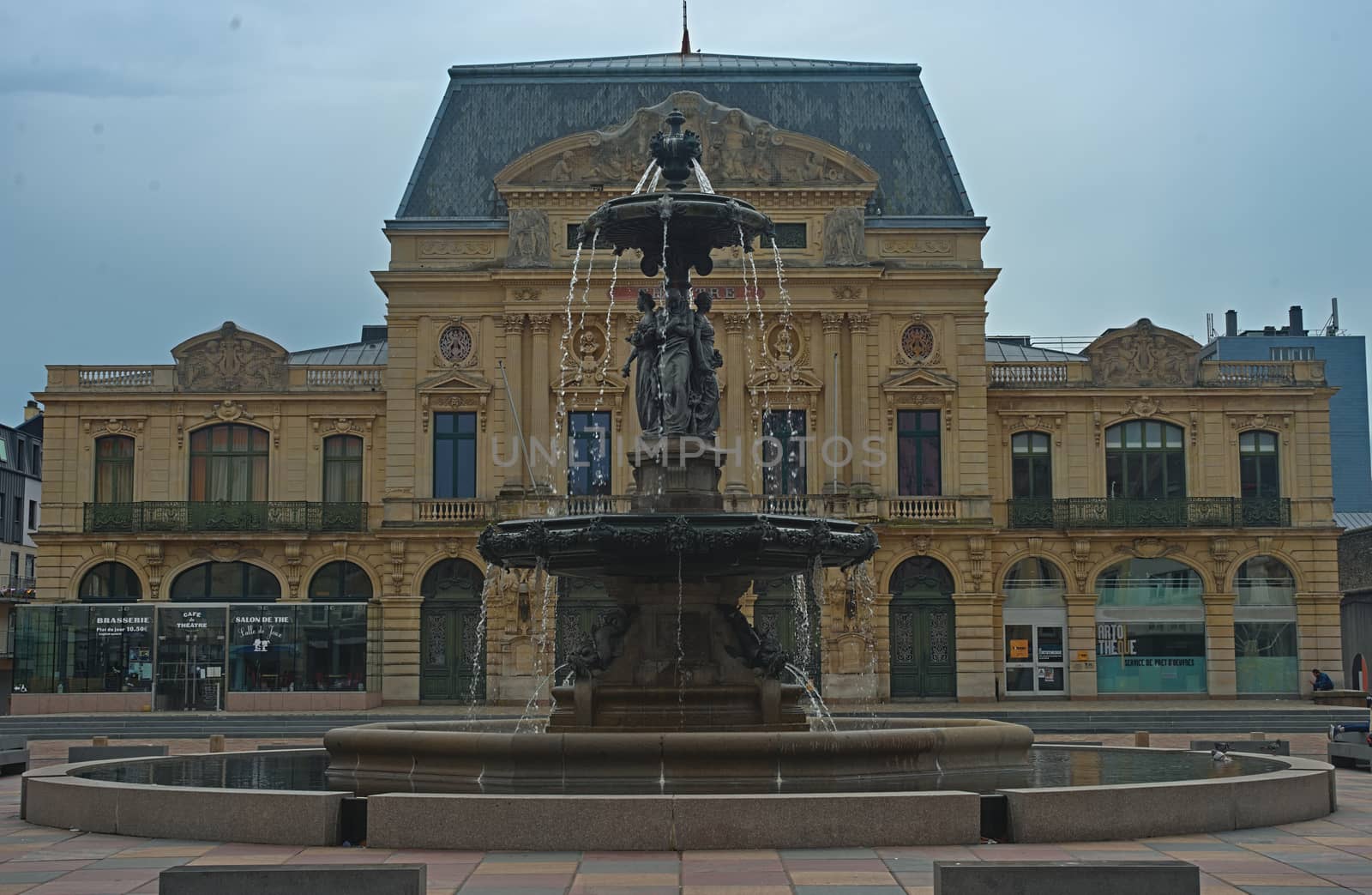 CHERBOURG, FRANCE - June 6th 2019 - impressive fountain with theater building behind it by sheriffkule