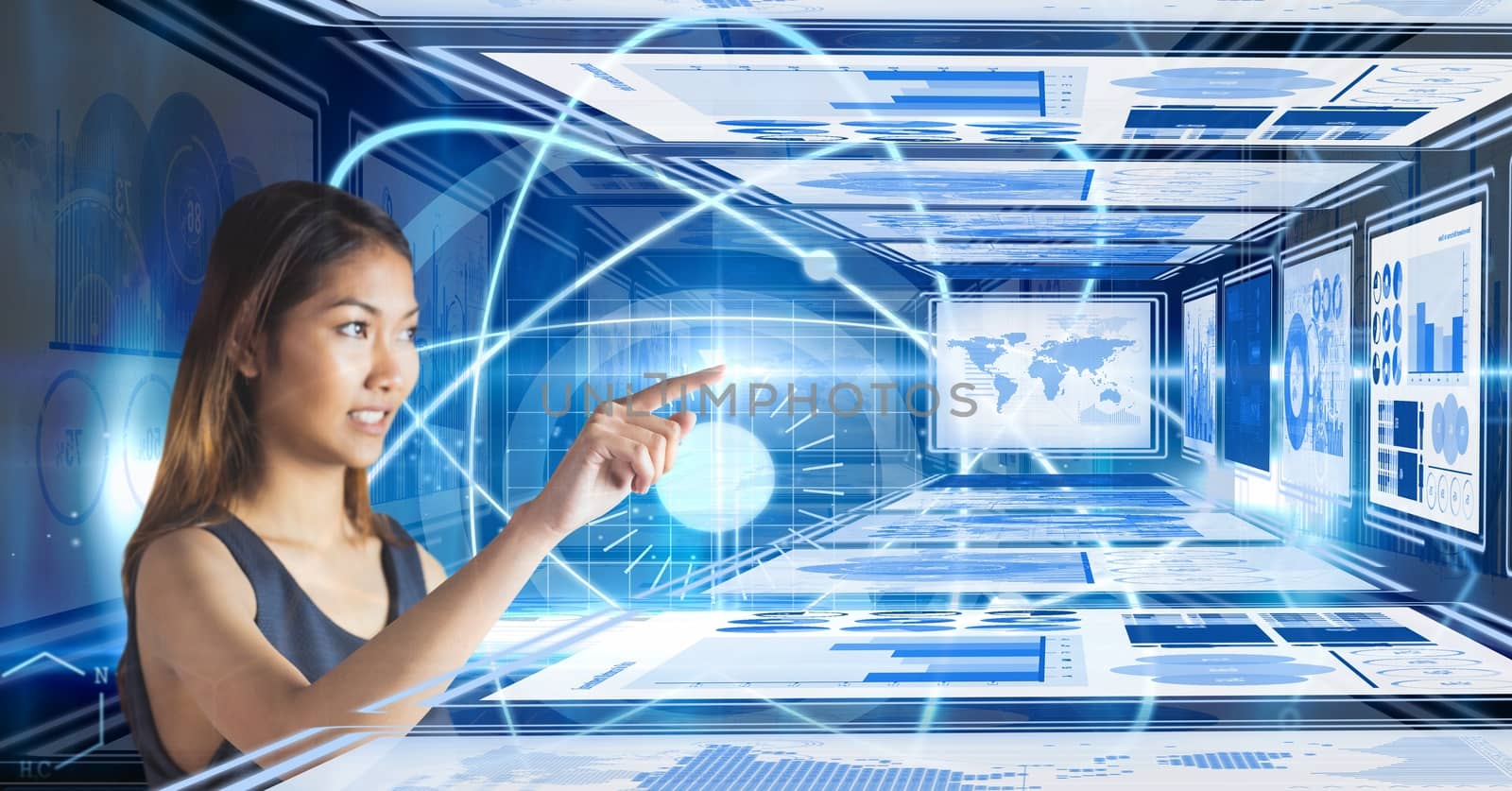 Digital composite of Businesswoman touching and interacting with technology interface panels