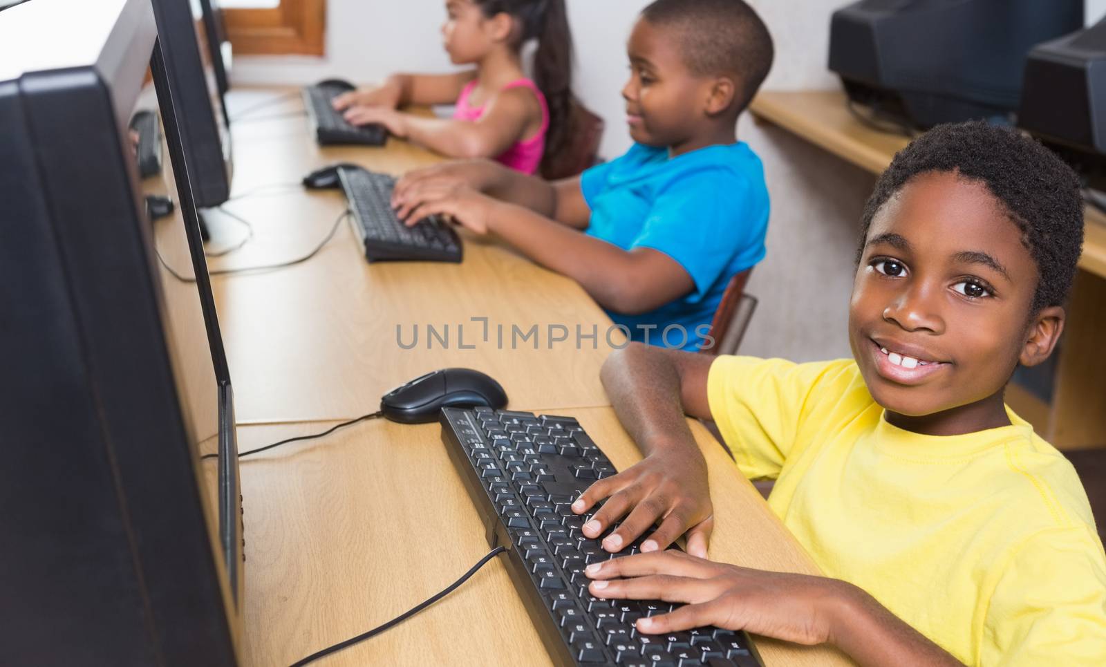 Cute pupils in computer class by Wavebreakmedia