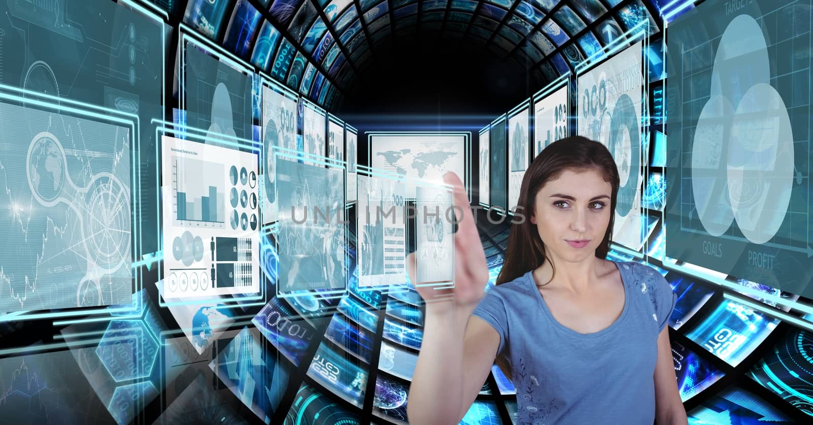 Businesswoman touching and interacting with technology interface panels by Wavebreakmedia