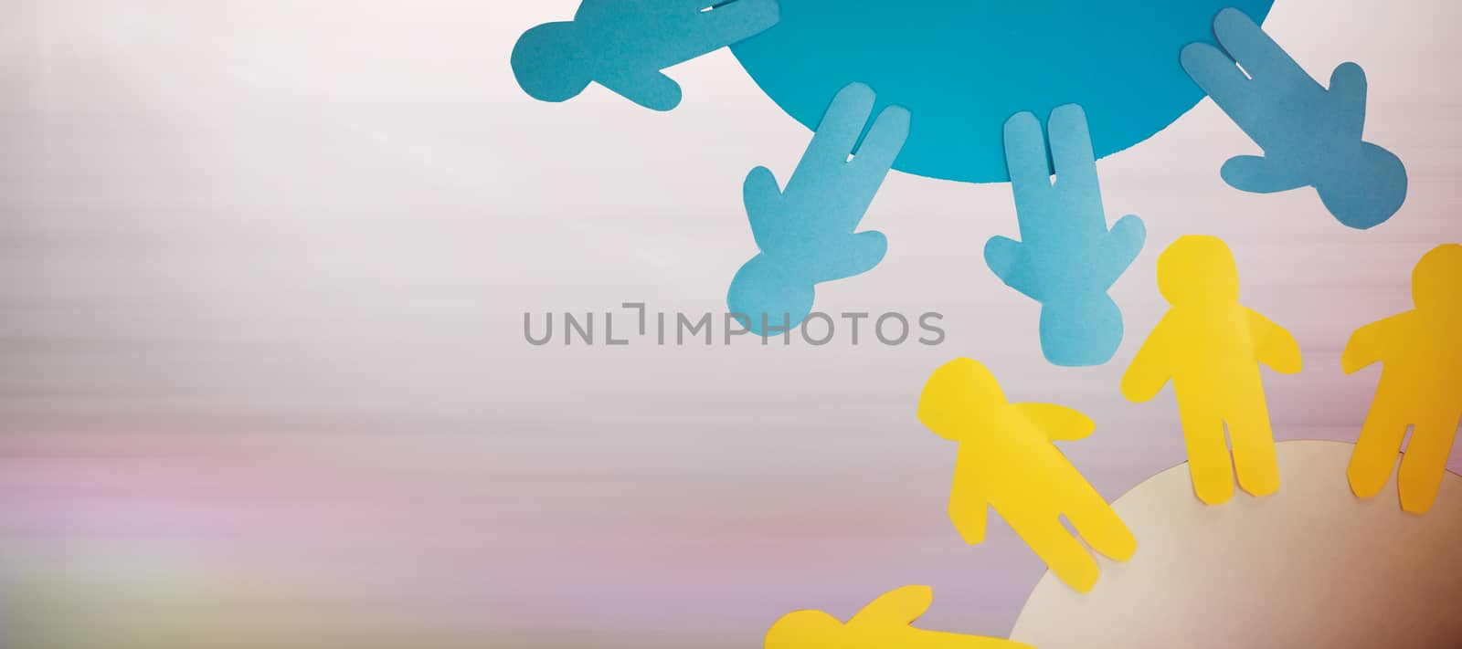 Composite image of yellow and blue little person on circle  by Wavebreakmedia