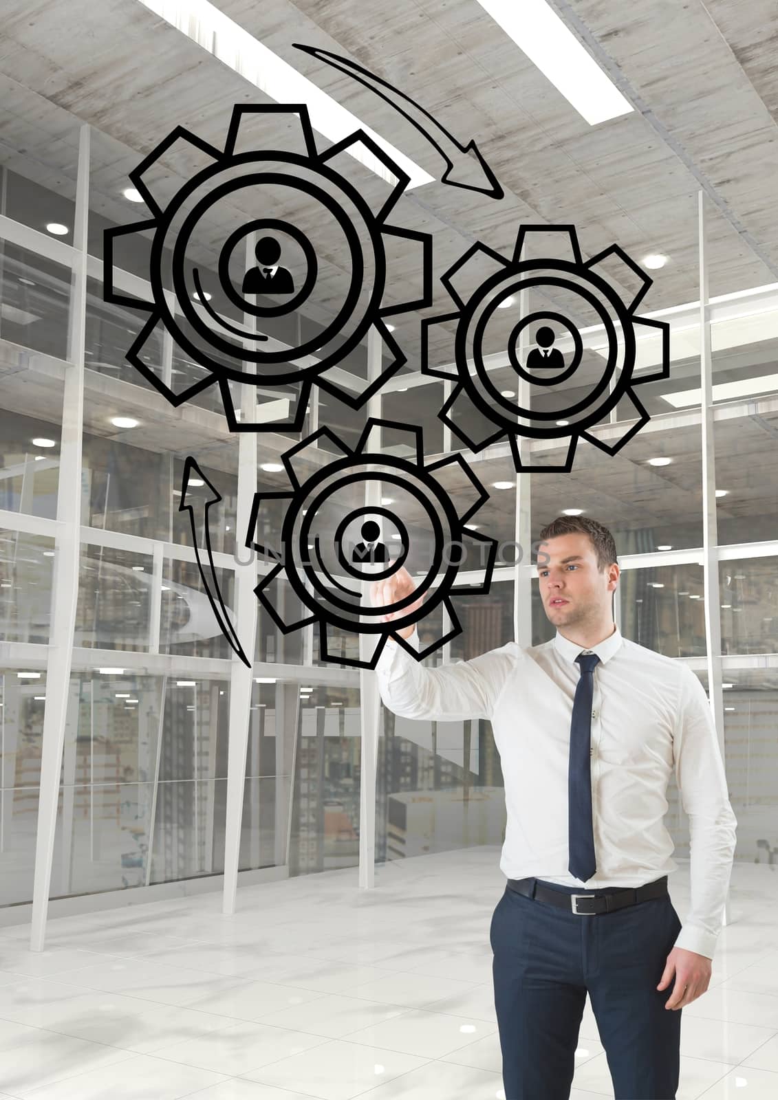 Digital composite of Business man interacting with people in cogs graphics against office background
