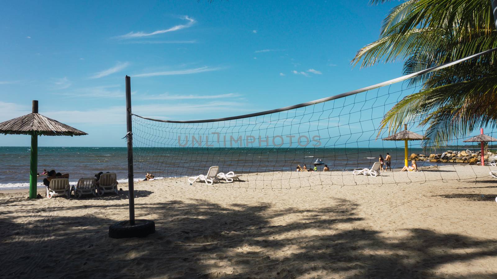 Volleyball field with great sun on the beach with a blue sky