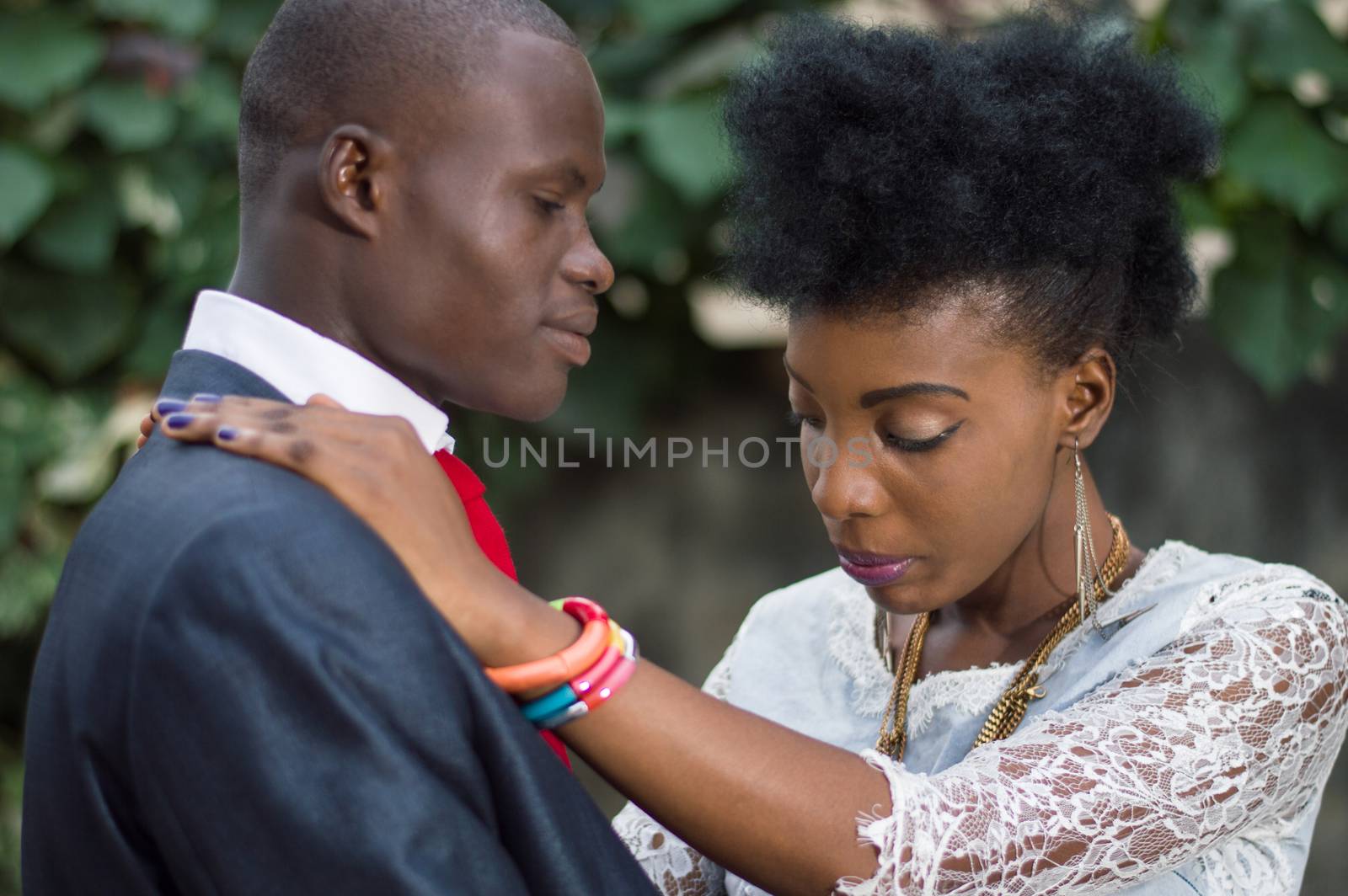 Young couple in love, entwined standing outside