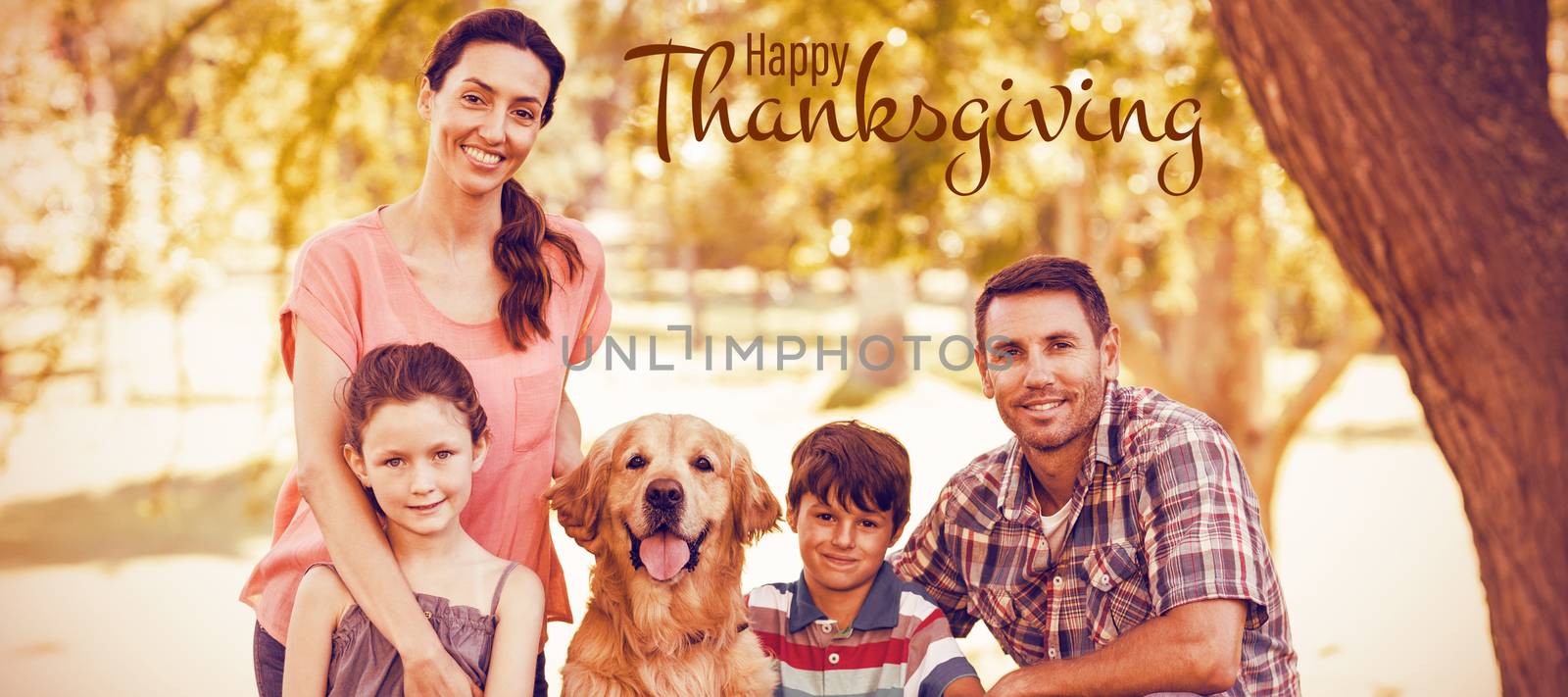 Illustration of happy thanksgiving day text greeting against portrait of happy family with dog in park
