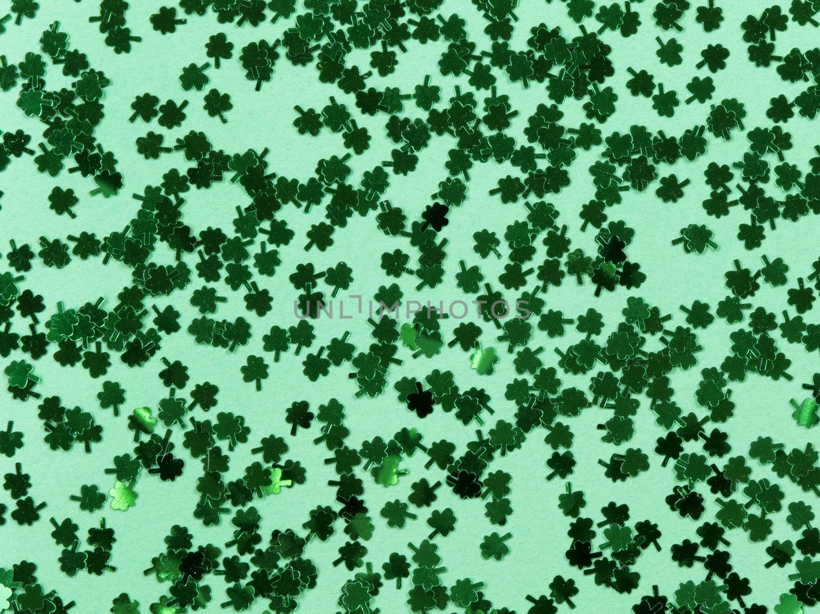 St Patricks Day with shamrocks on green background in filled fra by tab1962