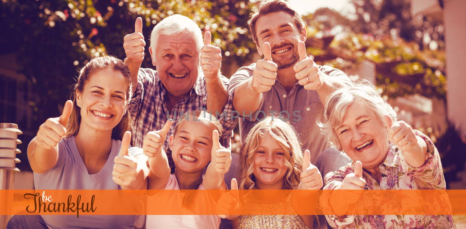 Thanksgiving greeting text against portrait of family gesturing thumbs up