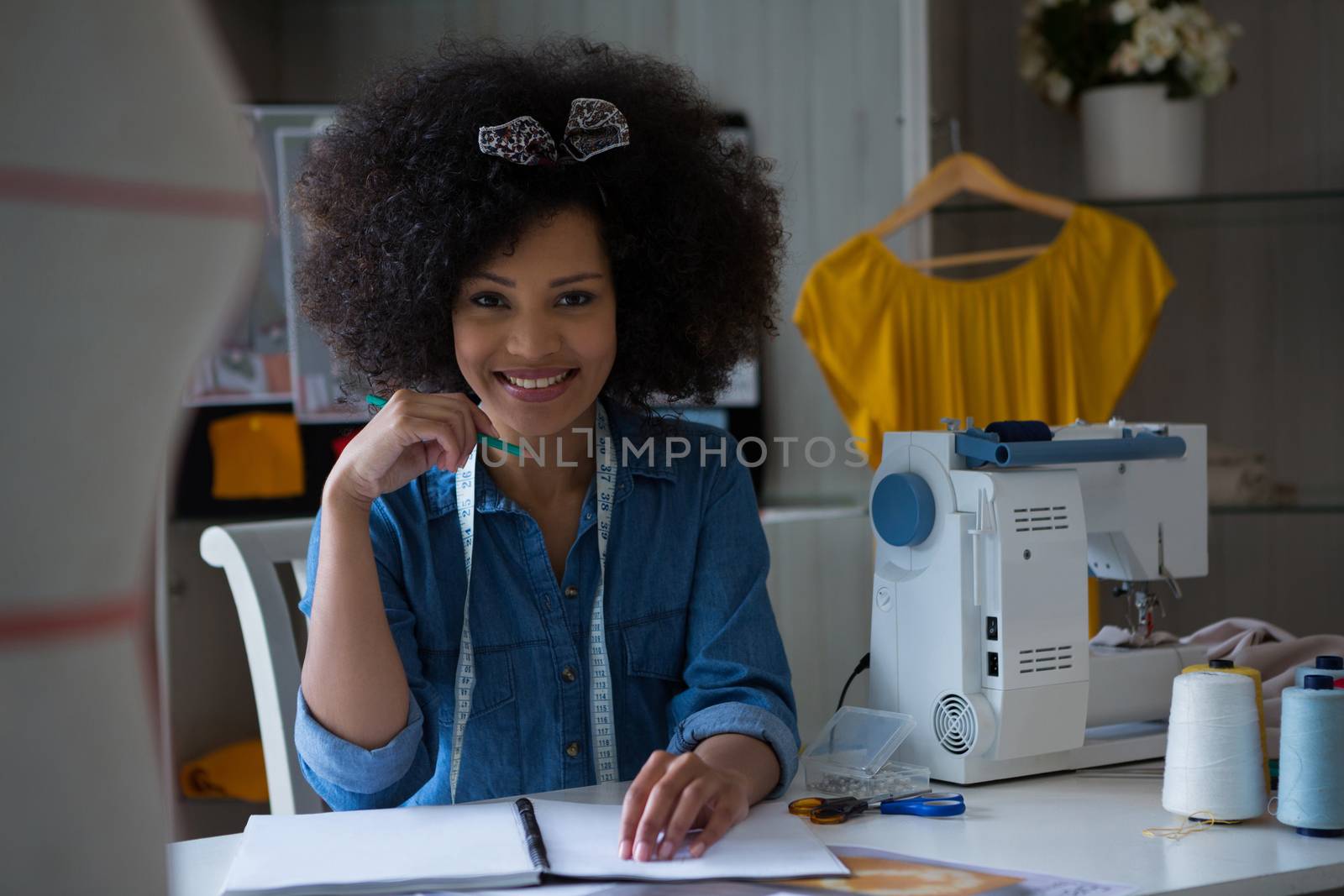 Female fashion designer working at desk by Wavebreakmedia