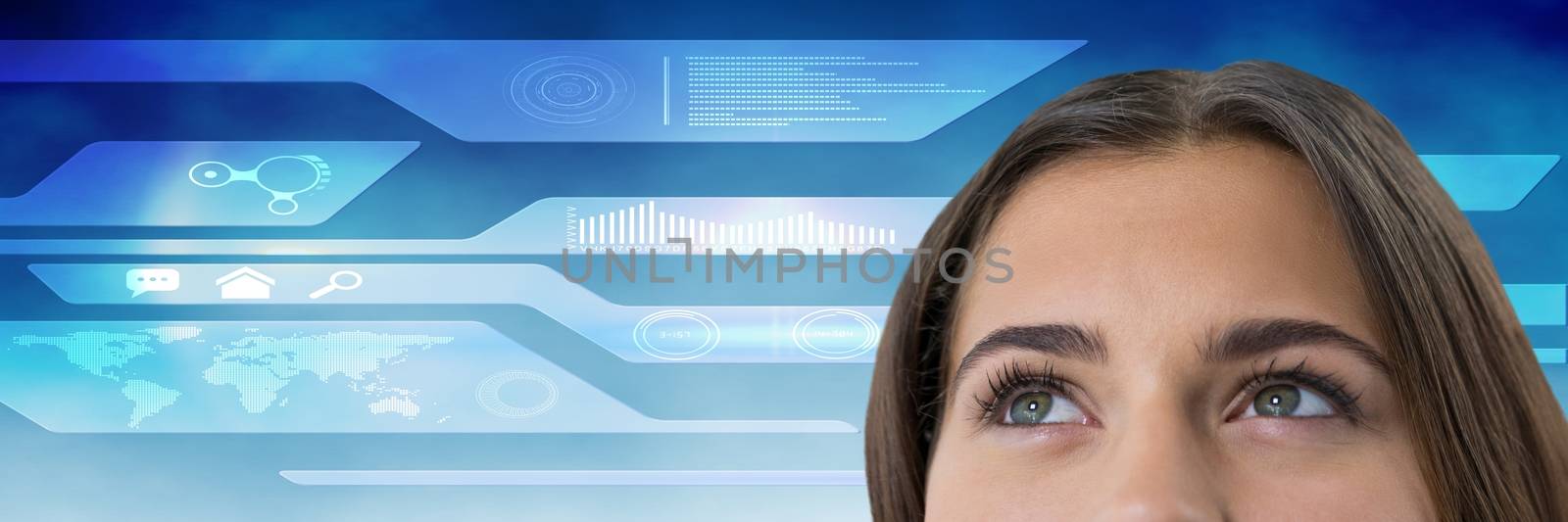 Digital composite of Woman looking up with technology background