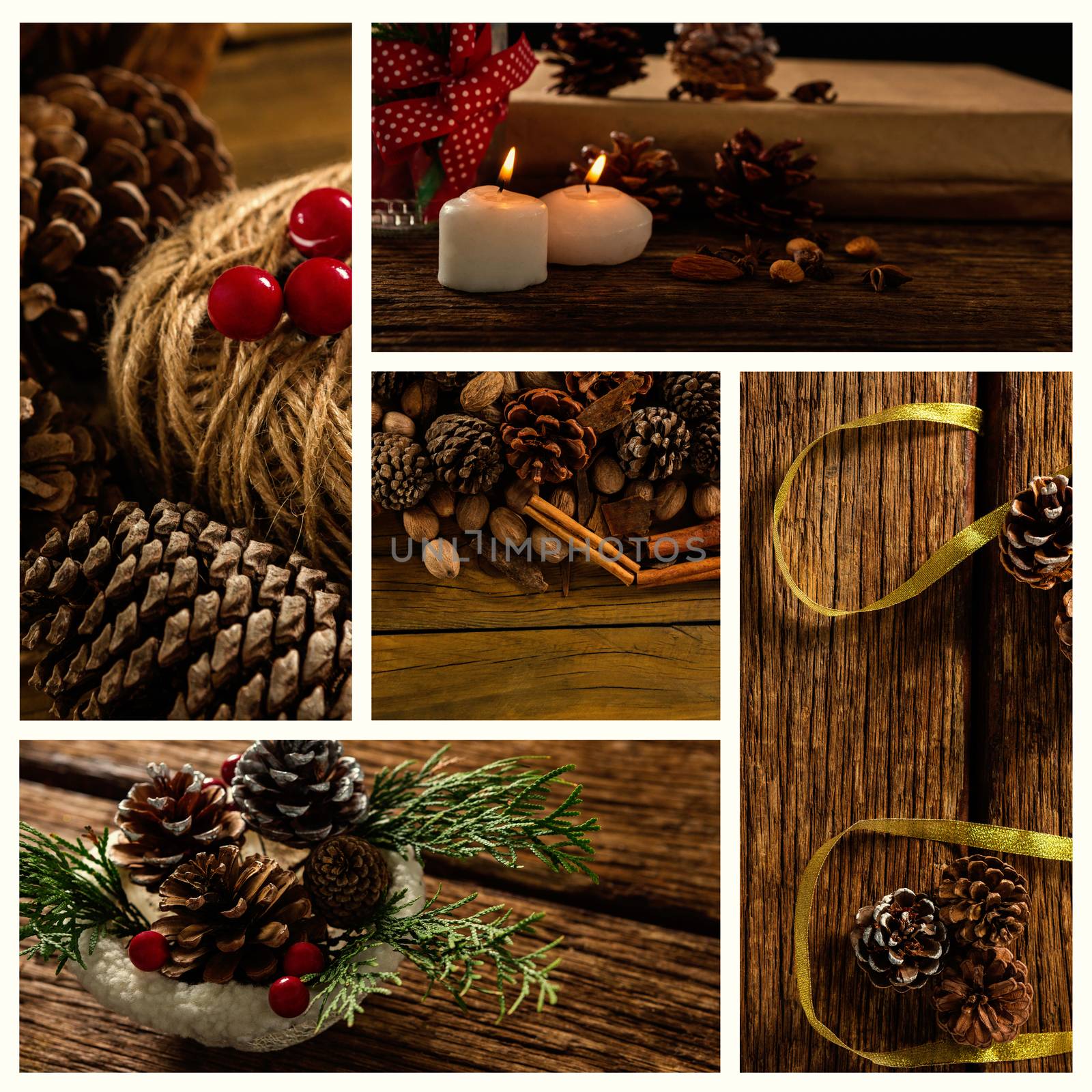 Candle and pine cone on wood table  by Wavebreakmedia