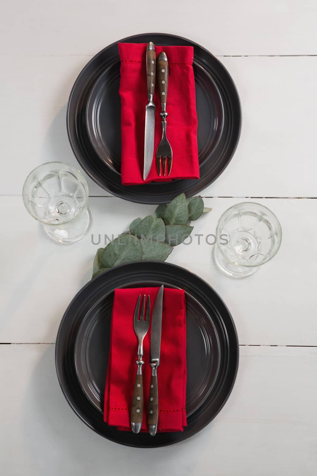 Overhead of elegance table setting on wooden plank