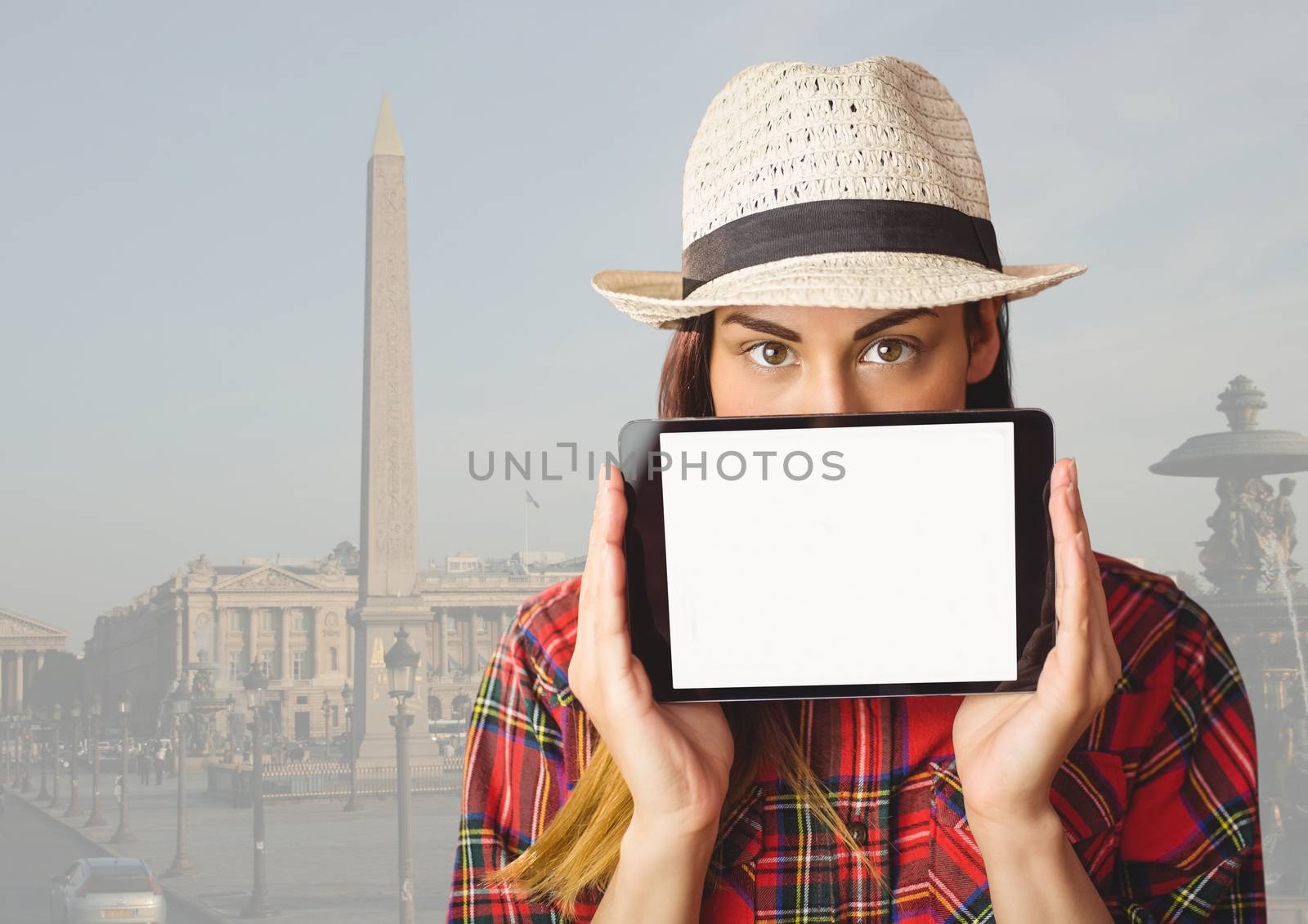 Digital composite of Girl holding tablet in travel destination