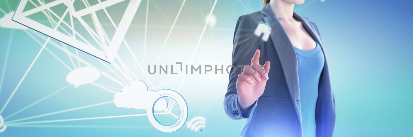 Composite image of mid section of businesswoman using imaginary interface by Wavebreakmedia