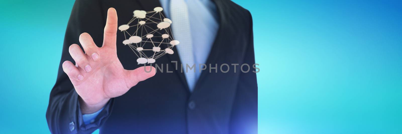 Mid section of businessman touching imaginary interface screen against abstract blue background