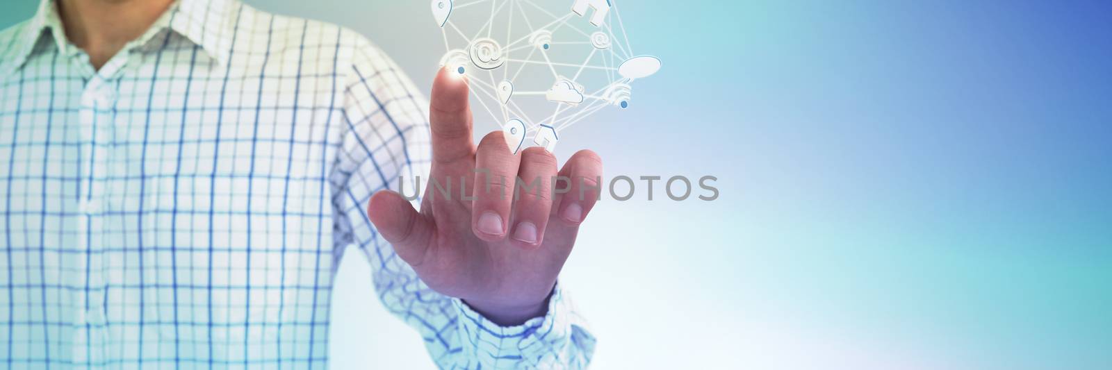 Man pretending to touch an invisible screen against white background against abstract blue background