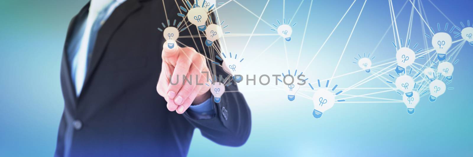 Mid section of businessman gesturing on invisible interface against abstract blue background