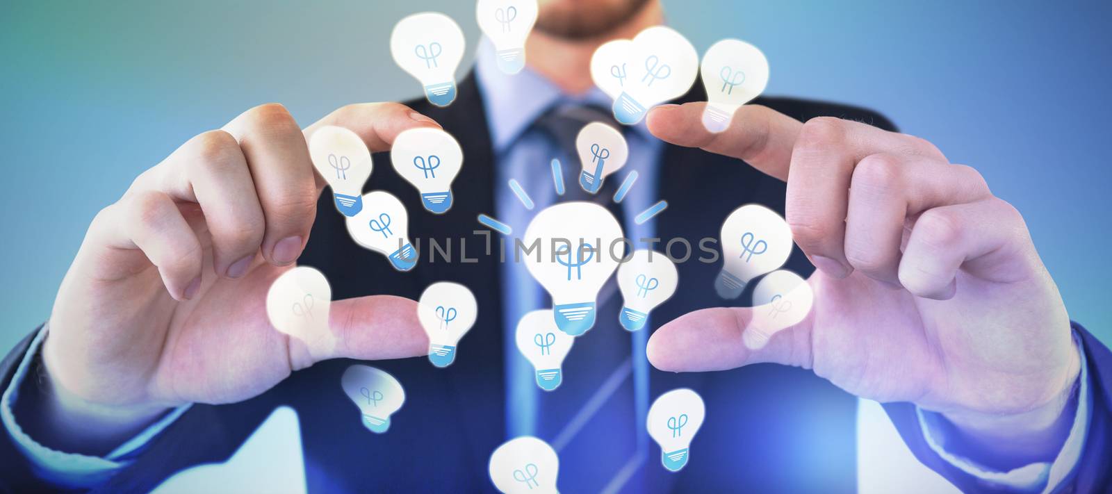 Mid section of businessman wearing suit while advertising invisible product against abstract blue background