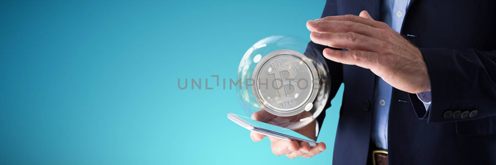 Businessman using mobile phone against abstract blue background