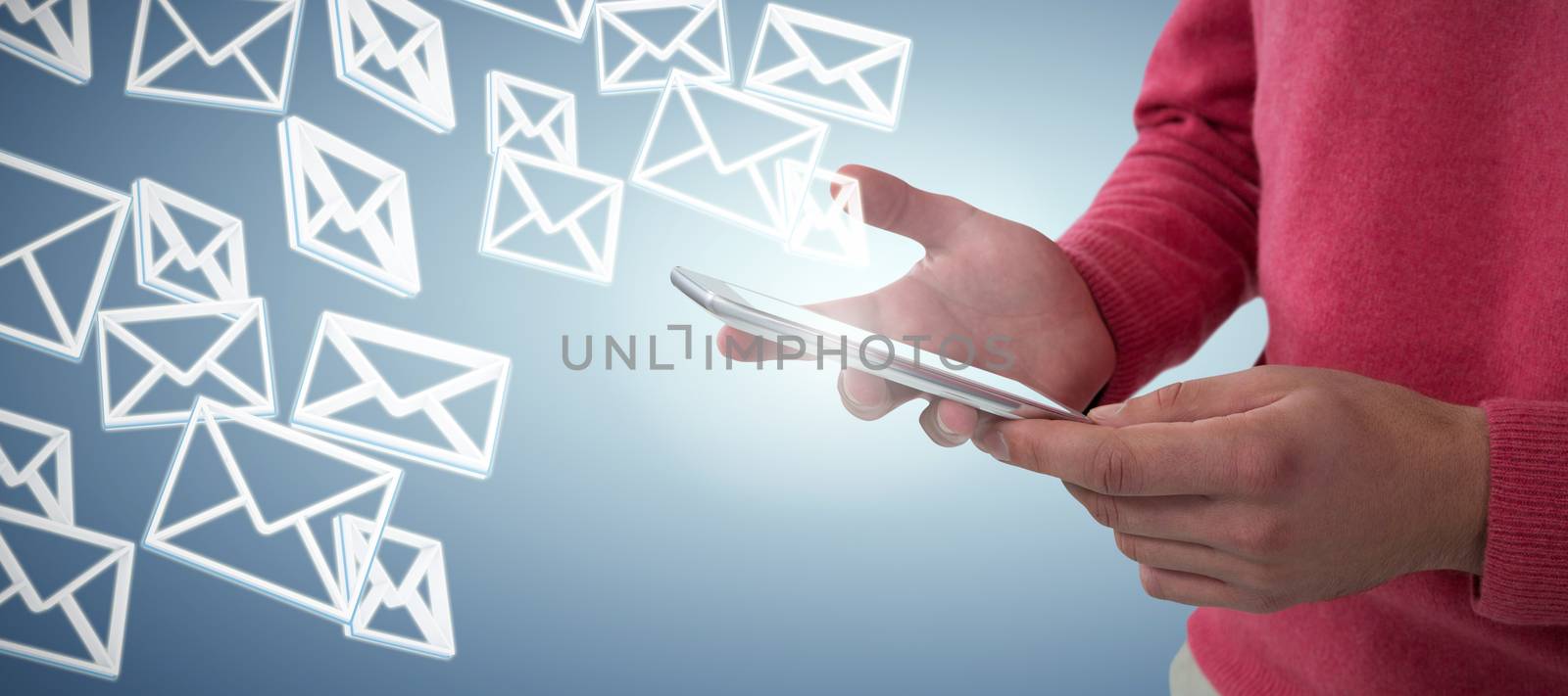 Mid section of man using mobile phone against abstract blue background