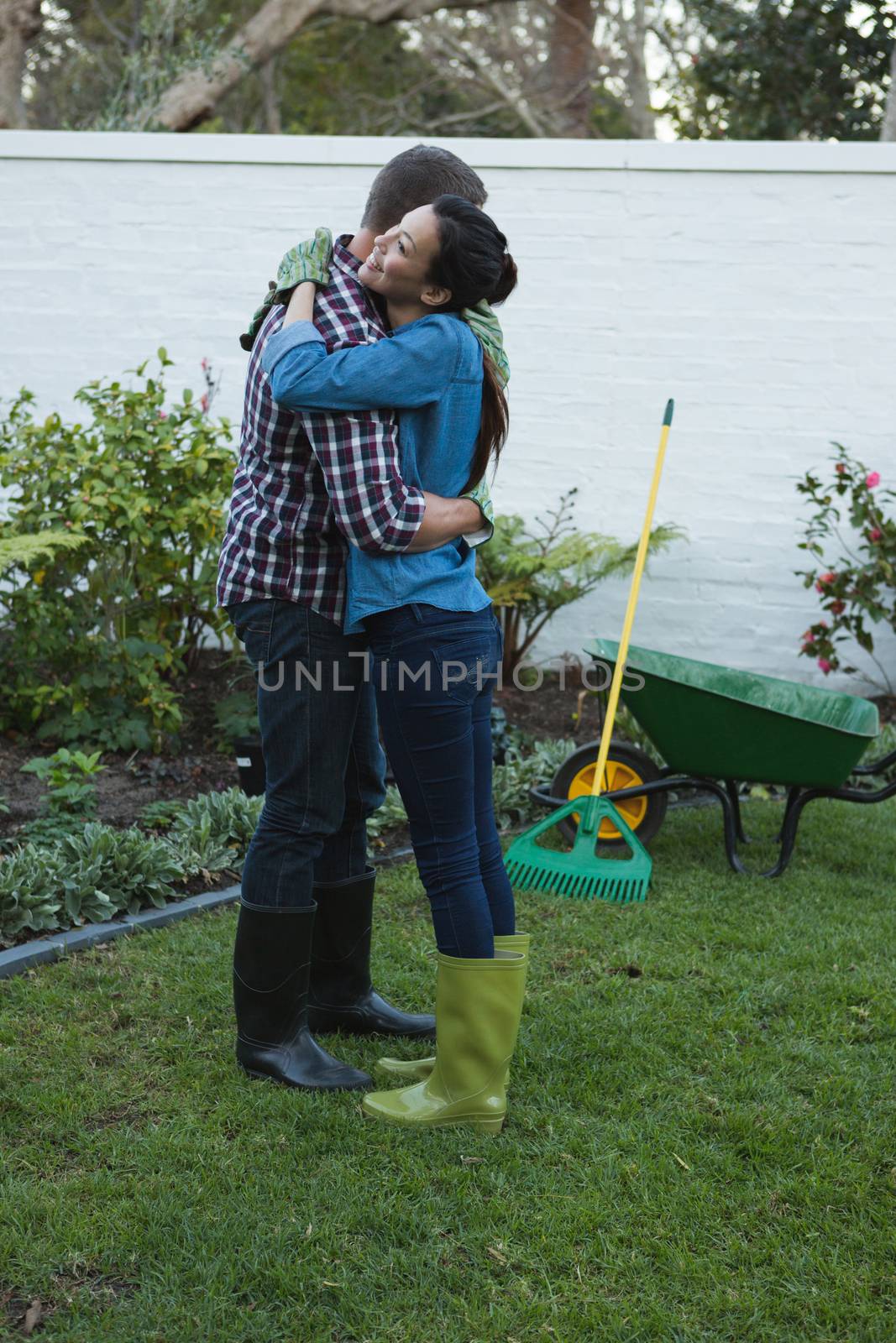 Romantic couple embracing each other in the garden