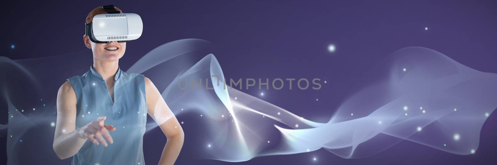 Composite image of smiling businesswoman with hand on hip gesturing while wearing virtual reality gl by Wavebreakmedia