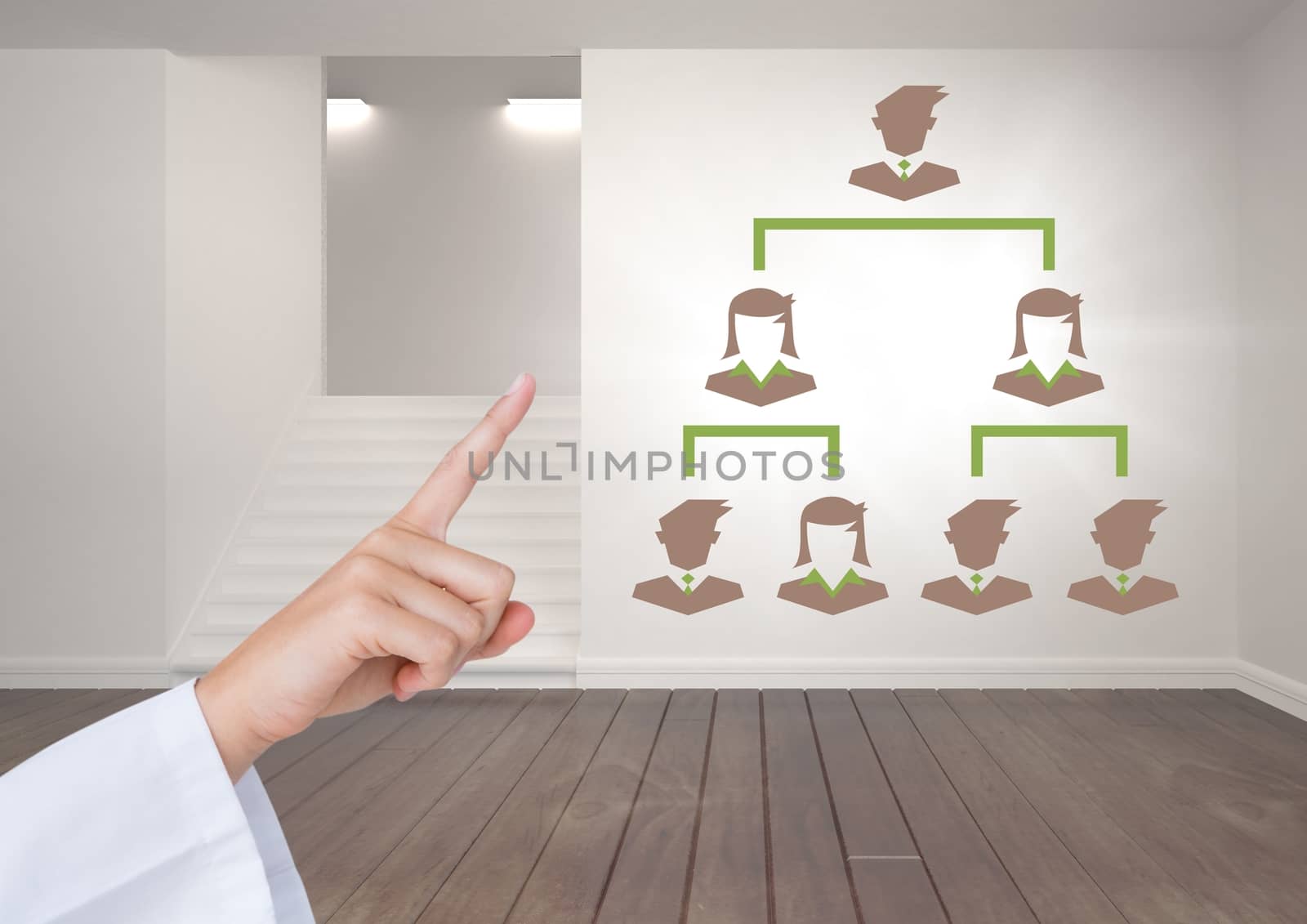 Digital composite of Hand interacting with Business people connected icons on wall