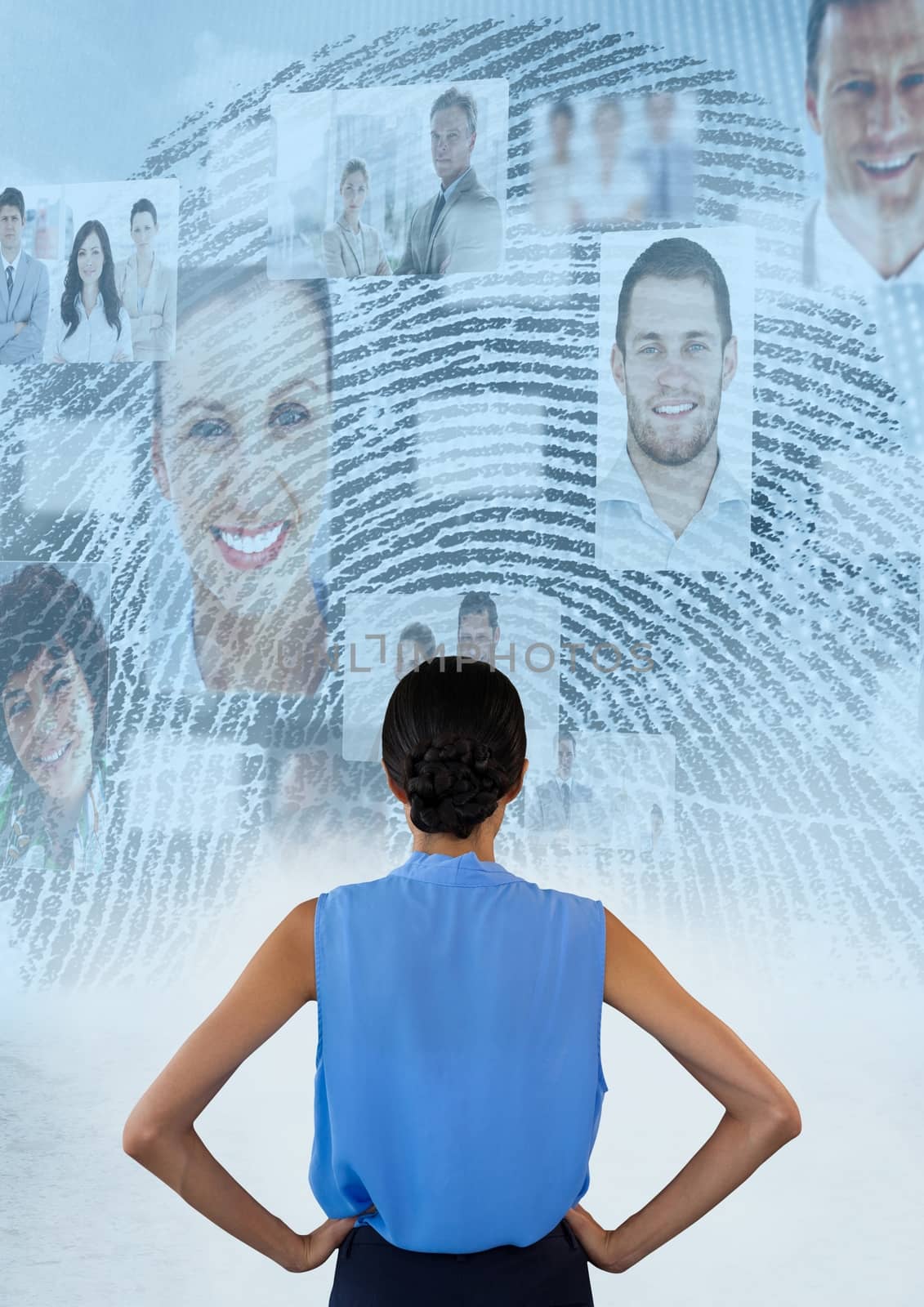 Digital composite of Woman standing hands on hips looking at interface of faces and a fingerprint