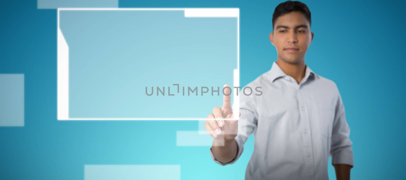 Man pretending to touch an invisible screen against abstract blue background
