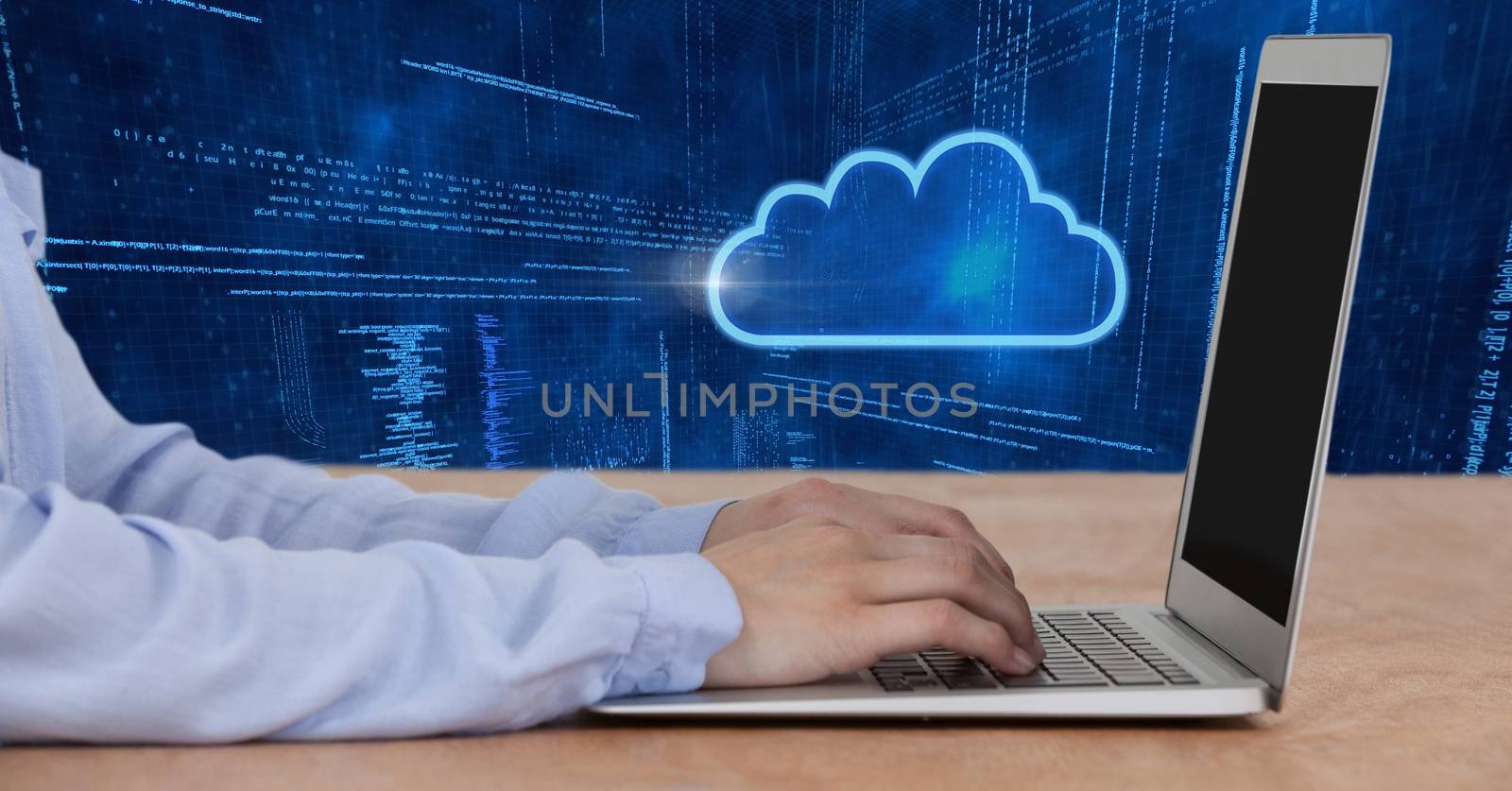 Digital composite of Hands using laptop and cloud icon with technology background