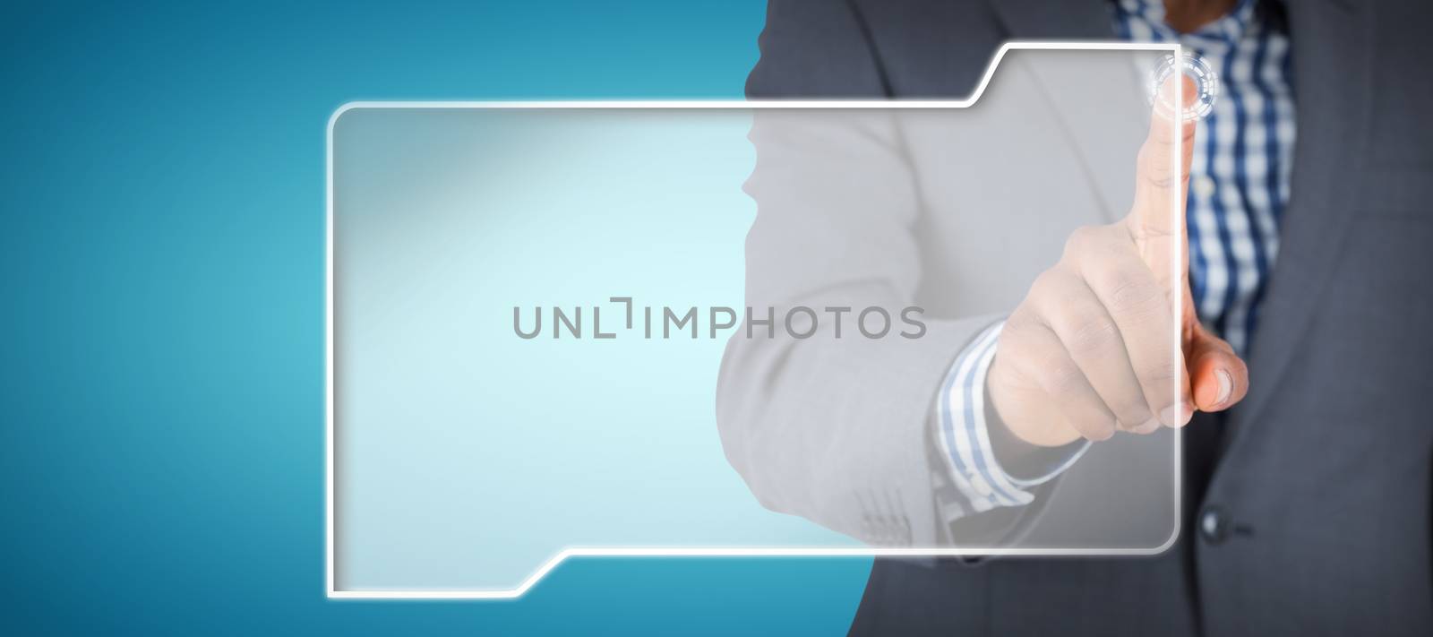 Focused businessman pointing against abstract blue background