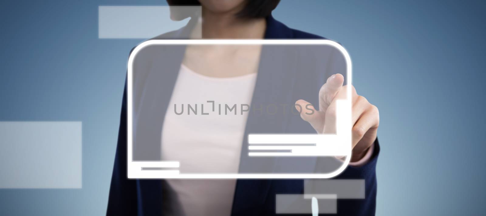 Mid section of businesswoman touching invisible screen against abstract blue background