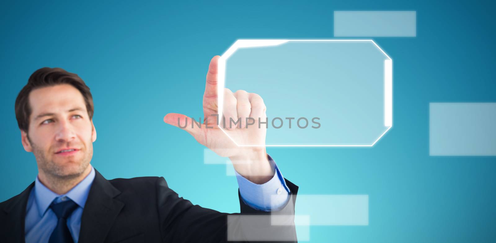 Composite image of confident businessman pointing at something by Wavebreakmedia