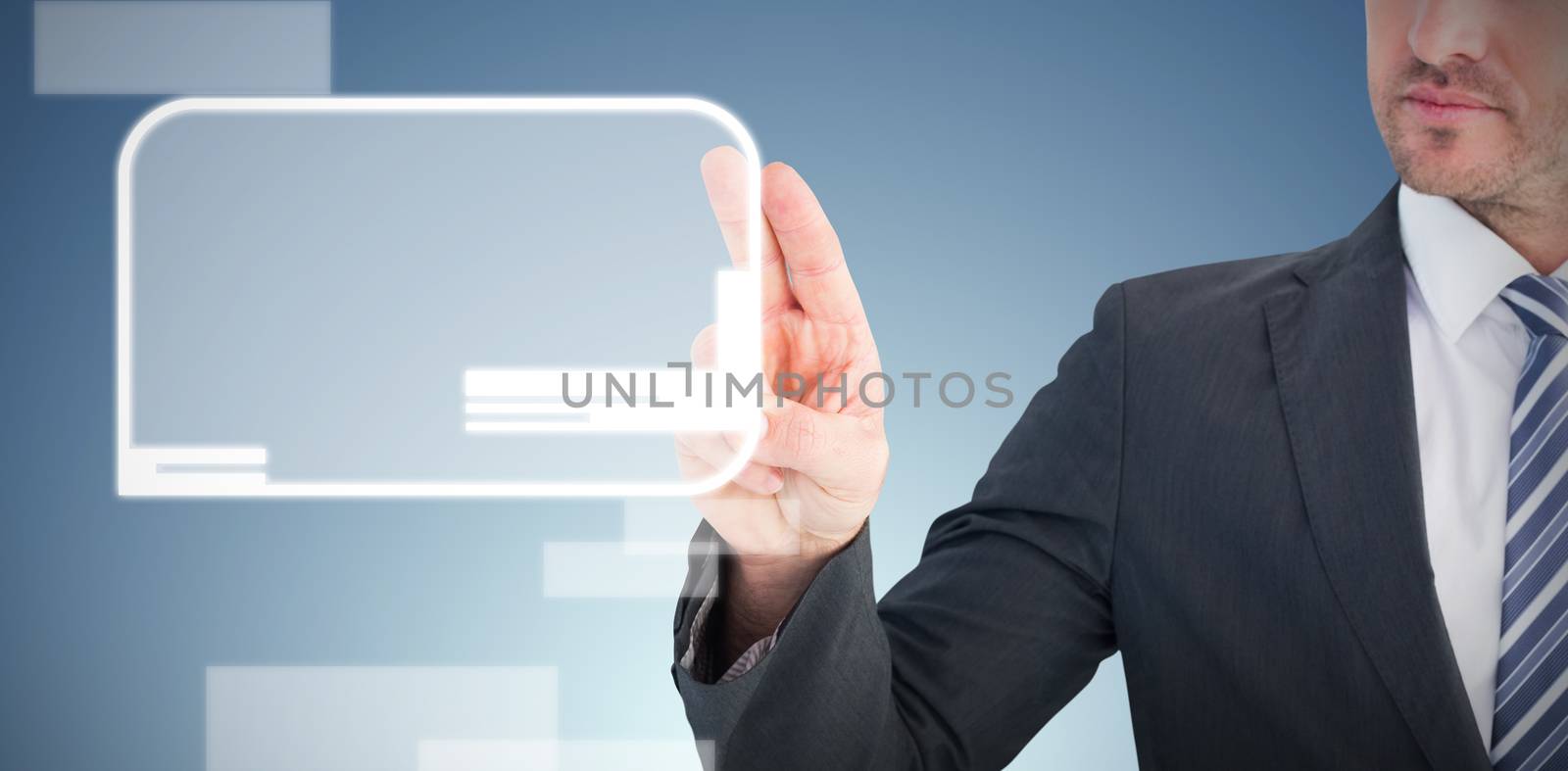 Businessman pointing with his finger against abstract blue background