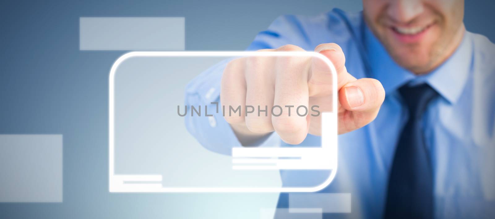 Friendly businessman pointing at the camera against abstract blue background