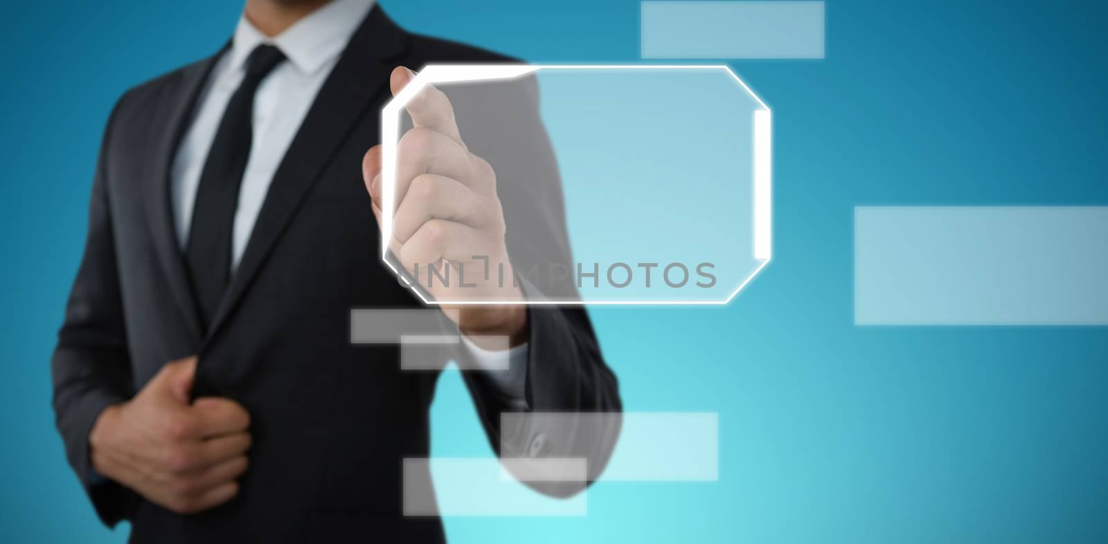 Mid section of businessman pointing against abstract blue background