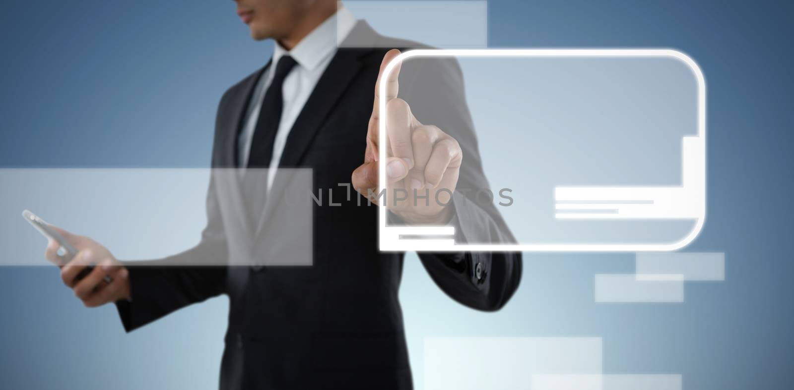 Composite image of mid section of businessman using phone while touching invisible interface by Wavebreakmedia