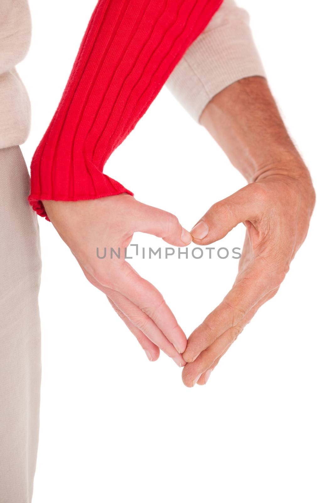 Close up of hands forming heart by Wavebreakmedia