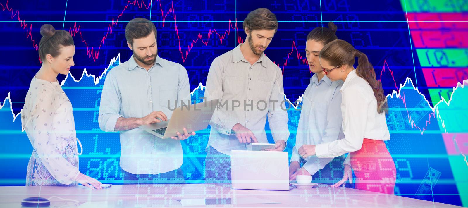 Composite image of business people interacting while standing at table by Wavebreakmedia